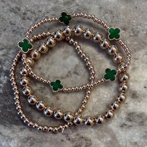 Gold and green brackets